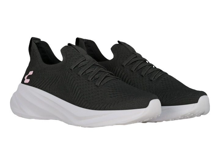 Tenis deportivos Charly color negro con suela blanca y detalle rosa en el lateral.