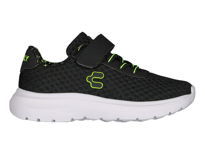 Tenis deportivos Charly color negro con suela blanca y detalles en verde lima, con cierre de velcro.