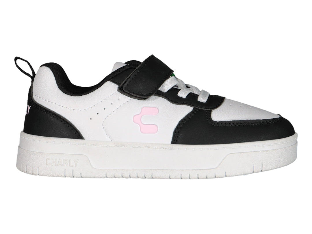 Tenis Charly blanco y negro con correa de velcro y suela blanca.