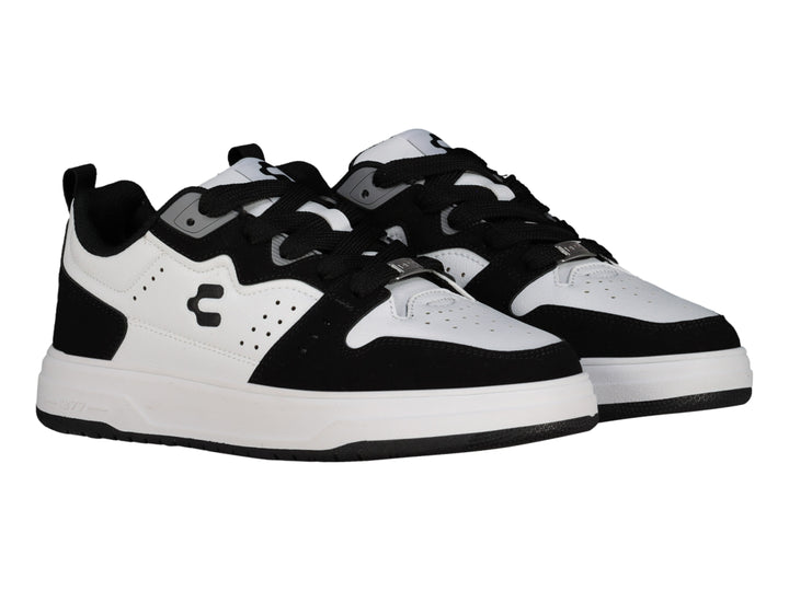 Tenis Charly Skurban en color blanco con detalles en negro y suela blanca.