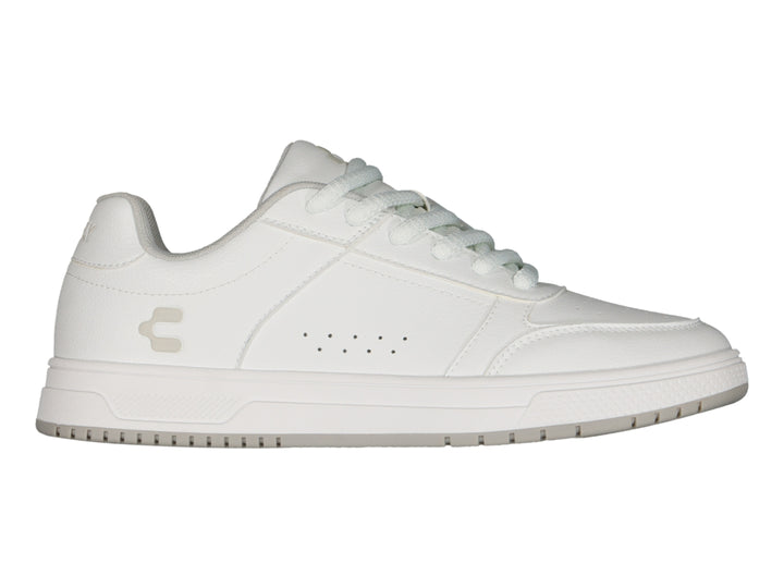 Tenis Charly color blanco de corte bajo con agujetas y suela plana.