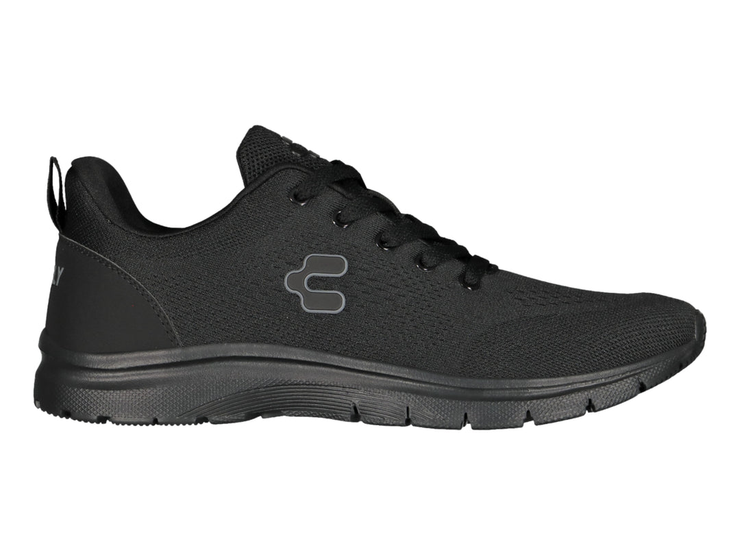 Zapato deportivo casual Charly en color negro con suela a juego y textura de malla.
