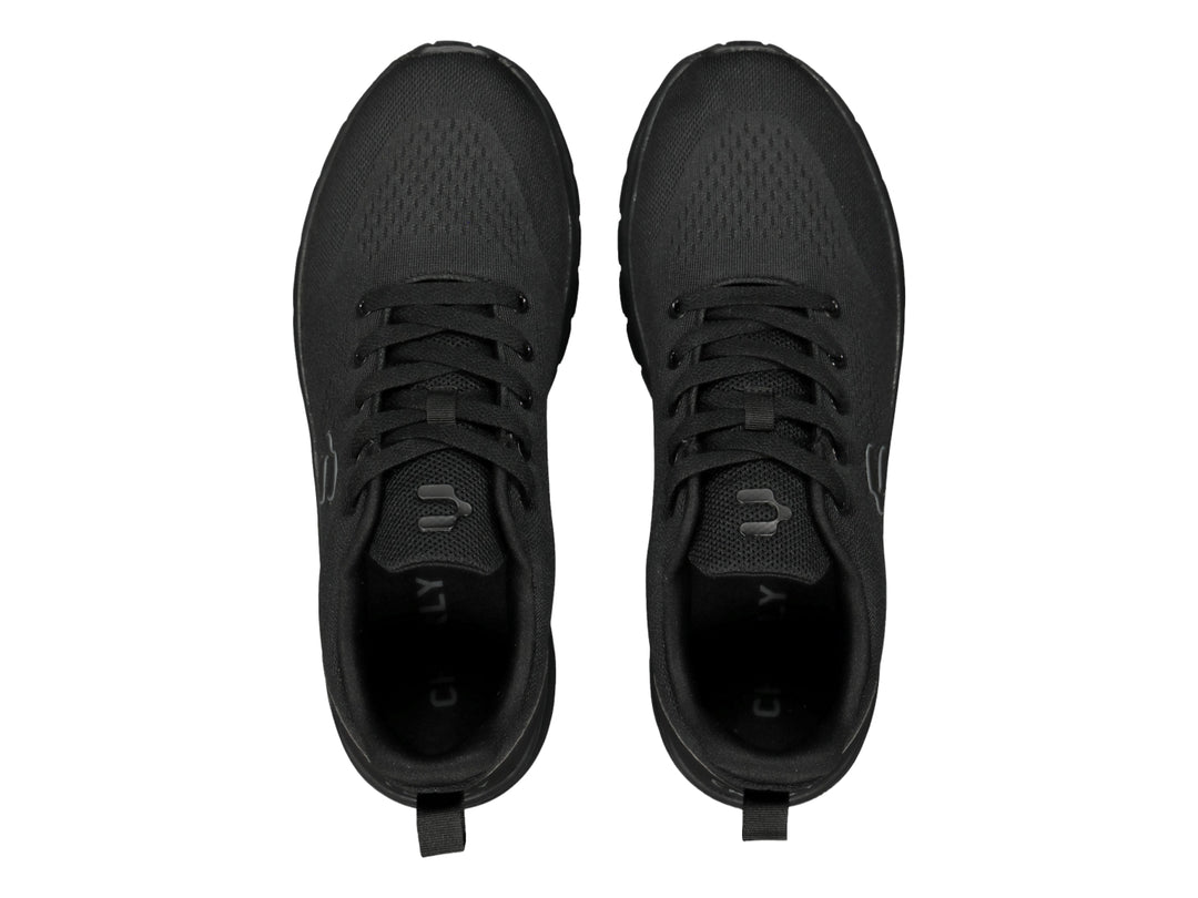 Zapato deportivo casual Charly en color negro con suela a juego y textura de malla.