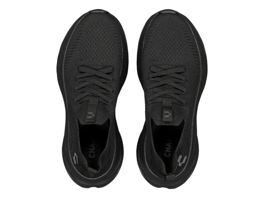 Tenis deportivos Charly color negro con tejido transpirable y suela robusta.