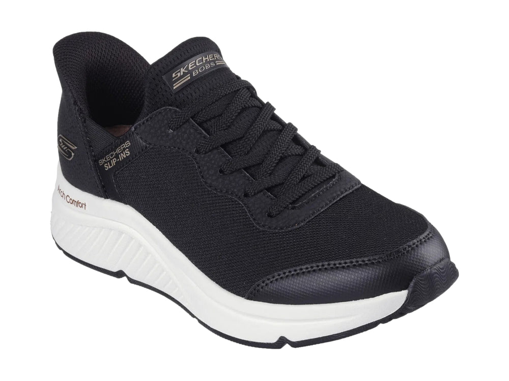 Tenis Skechers Slip-ins color negro con suela blanca y soporte Arch Comfort para mujer.