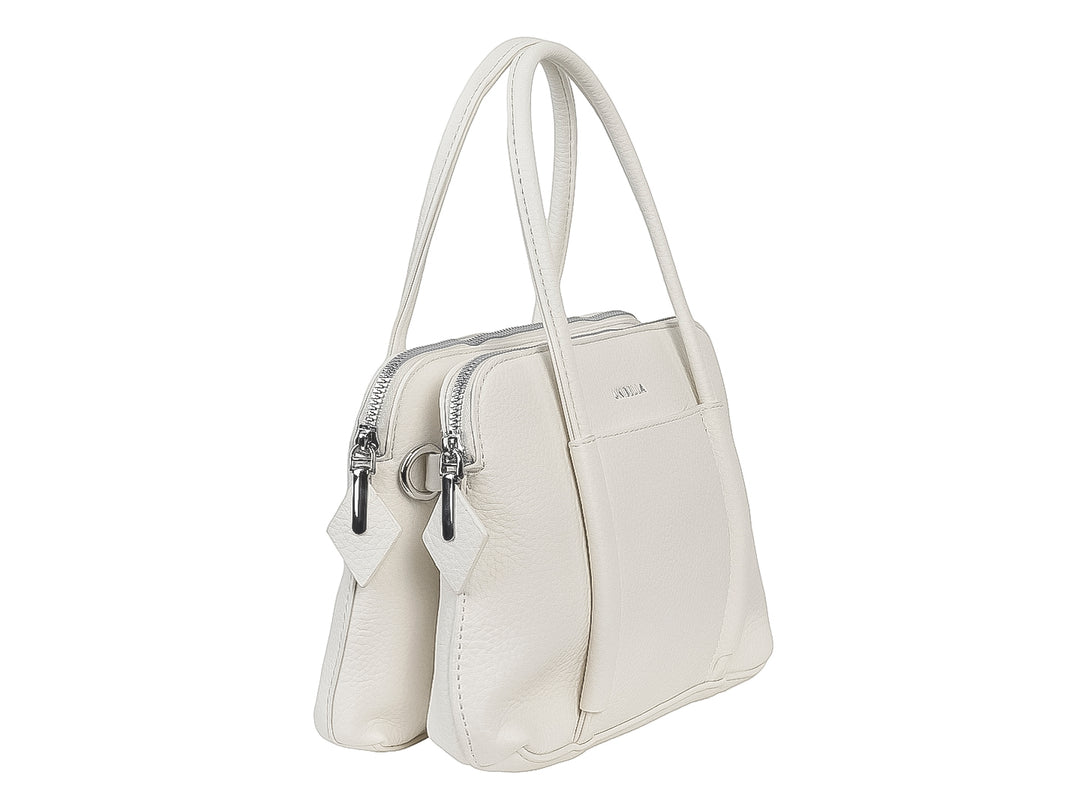 Bolso de mano color blanco marca Unibella con asas cortas y cierre superior.