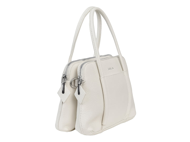 Bolso de mano color blanco marca Unibella con asas cortas y cierre superior.