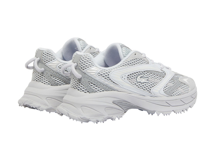 Tenis Lacoste L003 Neo Shot color gris para mujer con diseño deportivo y suela gruesa.