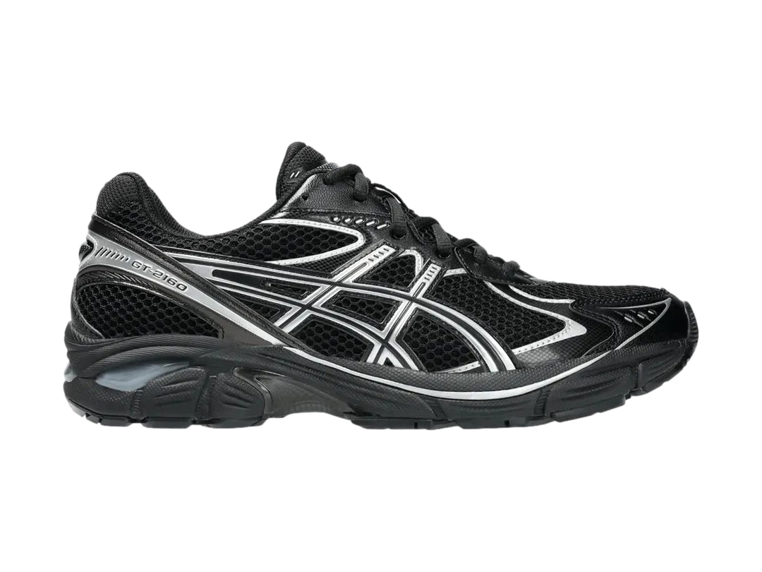Tenis deportivos ASICS GT-2160 color negro con detalles en plata, vista lateral.