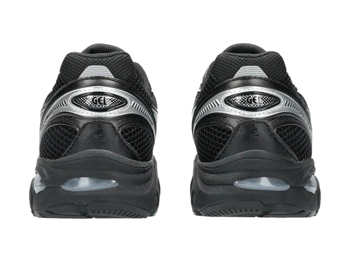 Tenis deportivos ASICS GT-2160 color negro con detalles en plata, vista lateral.
