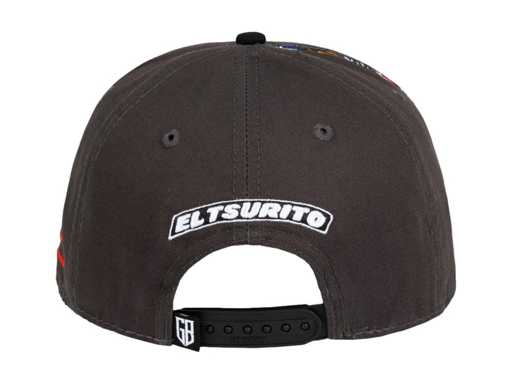 Gorra JC HATS color charcoal con visera negra y bordados decorativos en el frente y lateral.