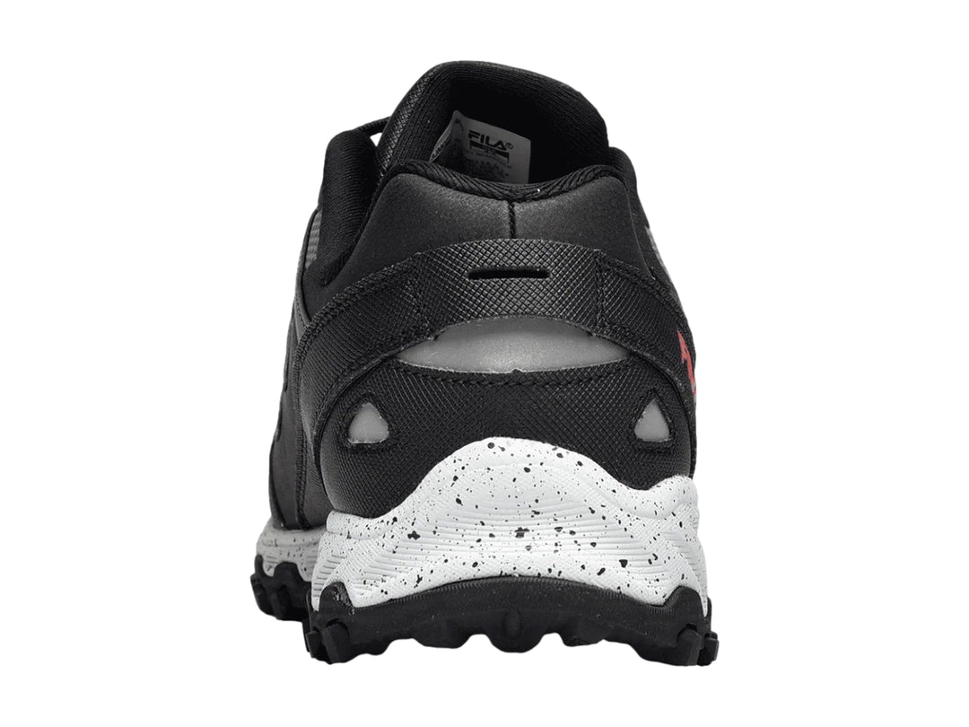 Tenis deportivos Fila Firetrail Evo en color azul y negro para niña con suela blanca y negra.