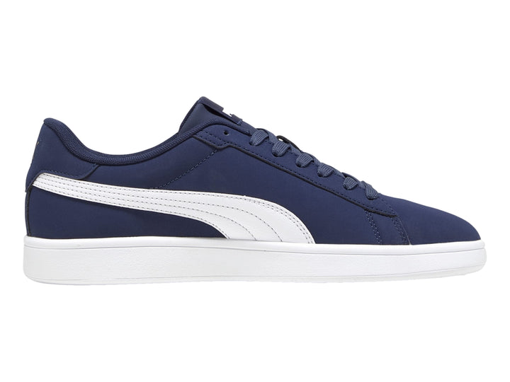 Tenis PUMA Smash 3.0 en color azul marino con franja lateral y suela en color blanco.