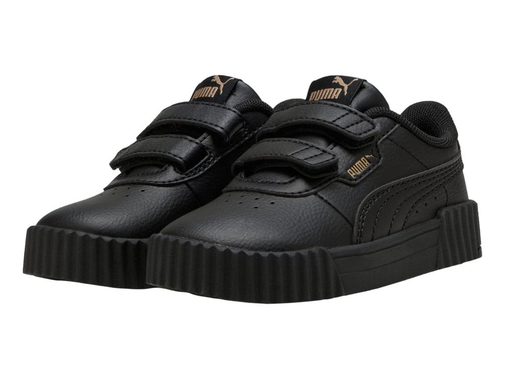 Tenis PUMA Carina 3.0 JR en color negro con cierre de velcro y suela ancha estriada.