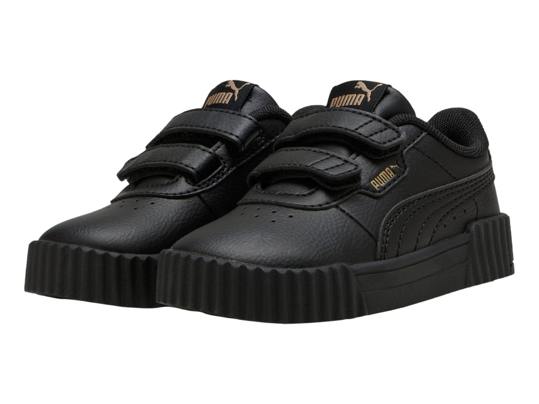 Tenis PUMA Carina 3.0 JR en color negro con cierre de velcro y suela ancha estriada.