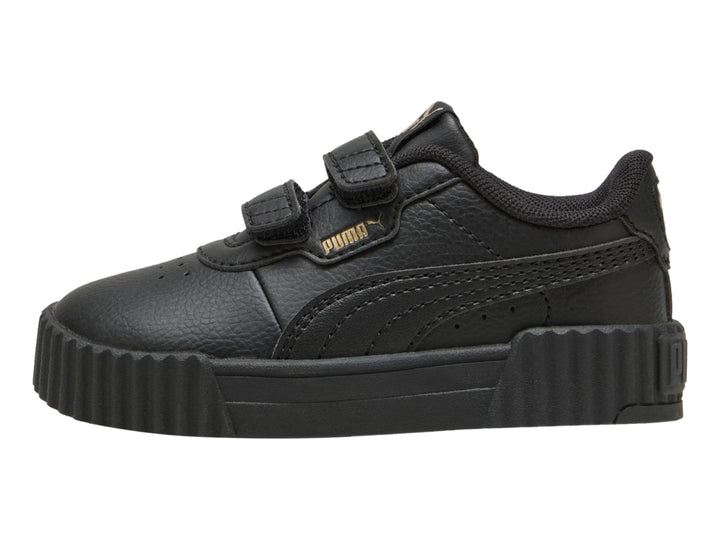 Tenis PUMA Carina 3.0 JR en color negro con cierre de velcro y suela ancha estriada.