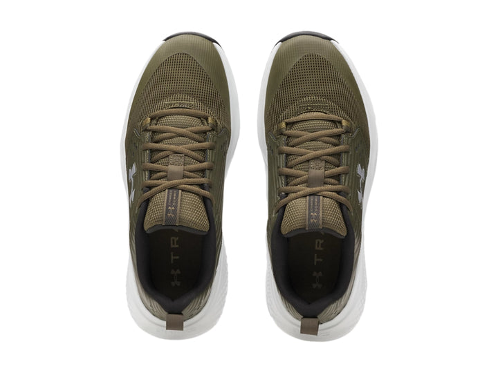 Tenis deportivos Under Armour color verde oliva con suela blanca y detalles en gris.