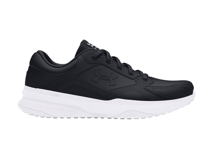 Tenis deportivos Under Armour color negro con suela blanca y detalles en cuero sintético.