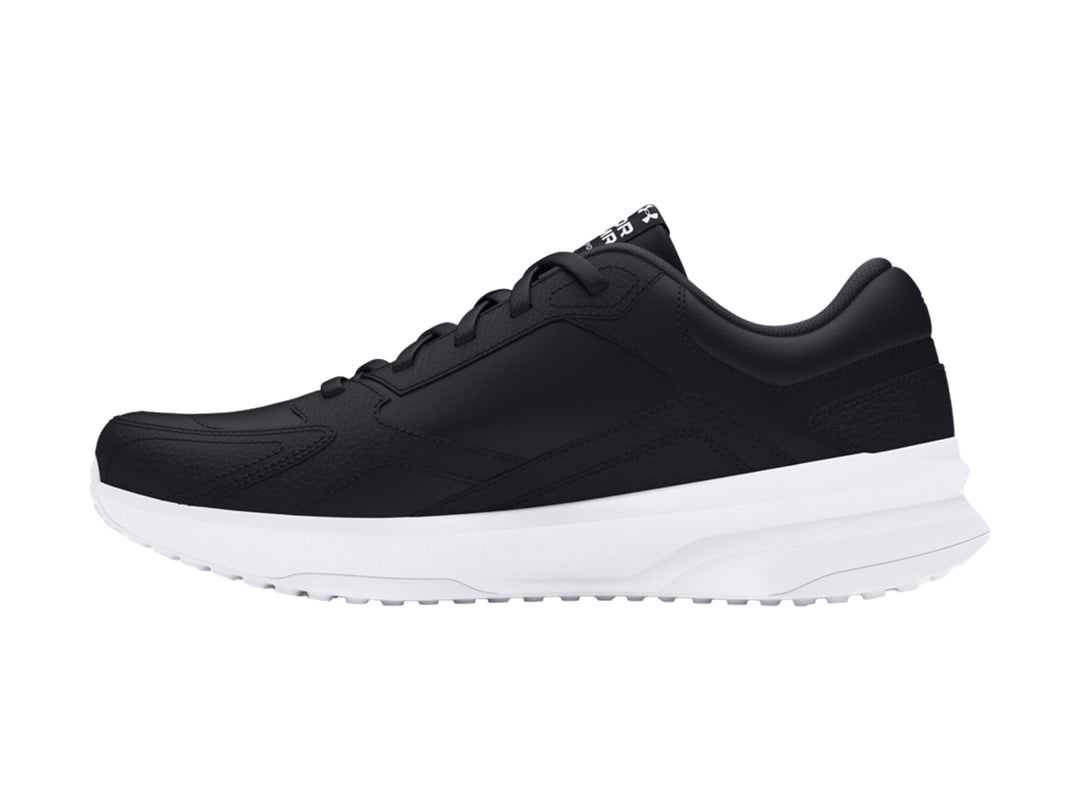 Tenis deportivos Under Armour color negro con suela blanca y detalles en cuero sintético.