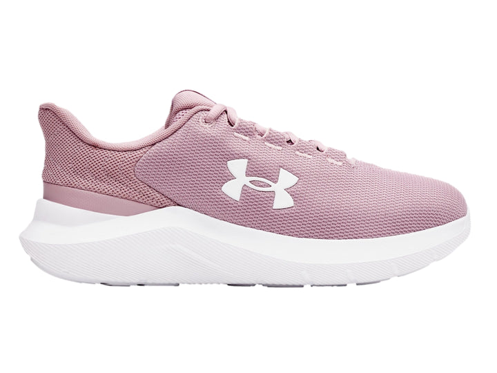 Tenis deportivos Under Armour en color rosa con suela blanca y logotipo blanco lateral.