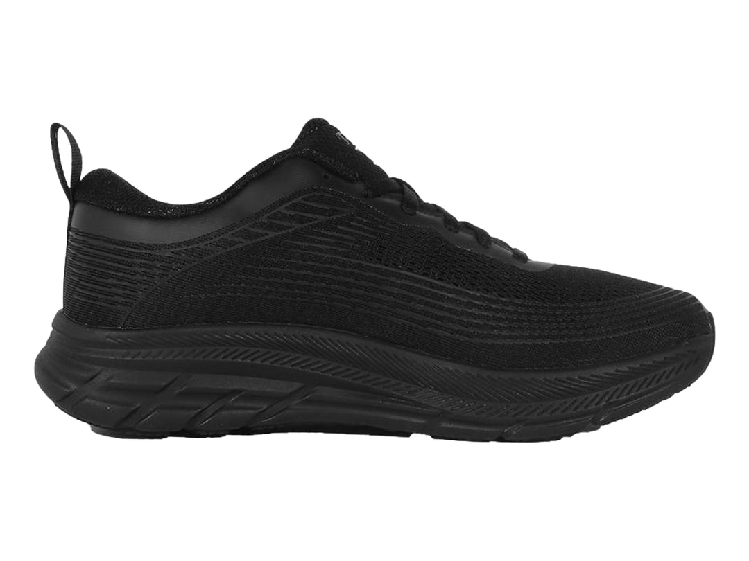 Tenis deportivos Reebok color negro con tejido transpirable y suela gruesa.