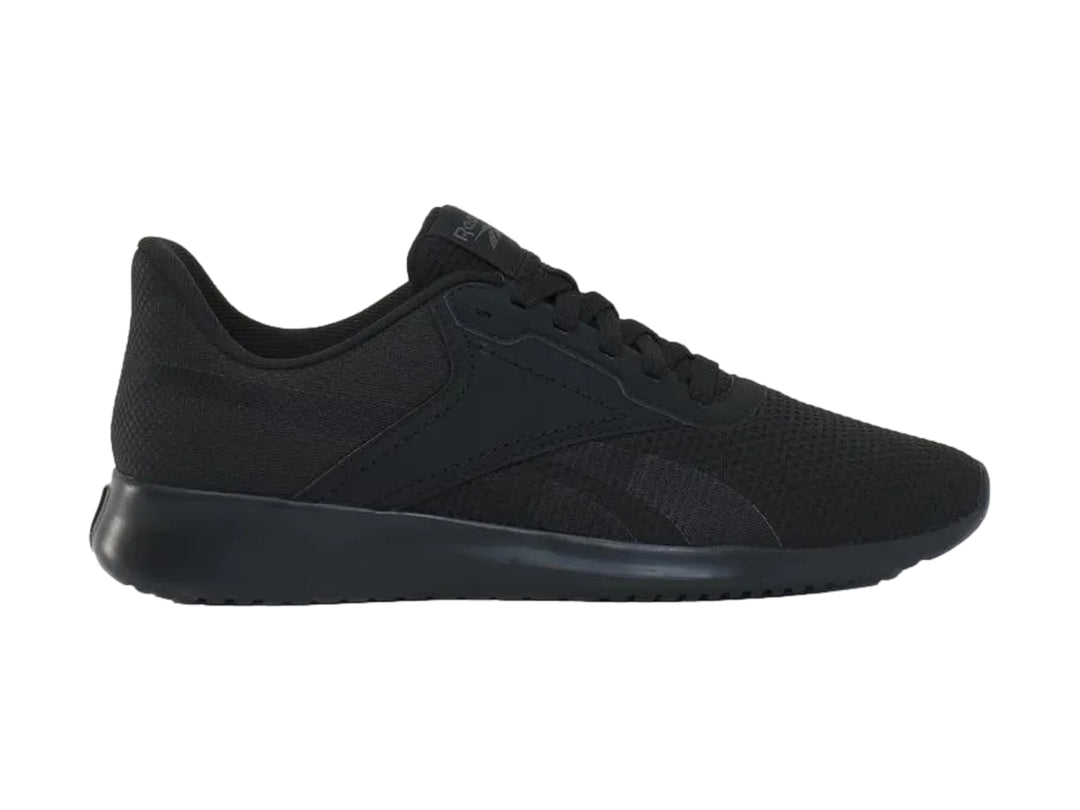 Zapato deportivo Reebok Fluxlite en color negro sólido con tejido de malla y suela a juego.