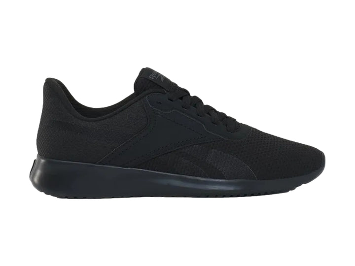 Zapato deportivo Reebok Fluxlite en color negro sólido con tejido de malla y suela a juego.