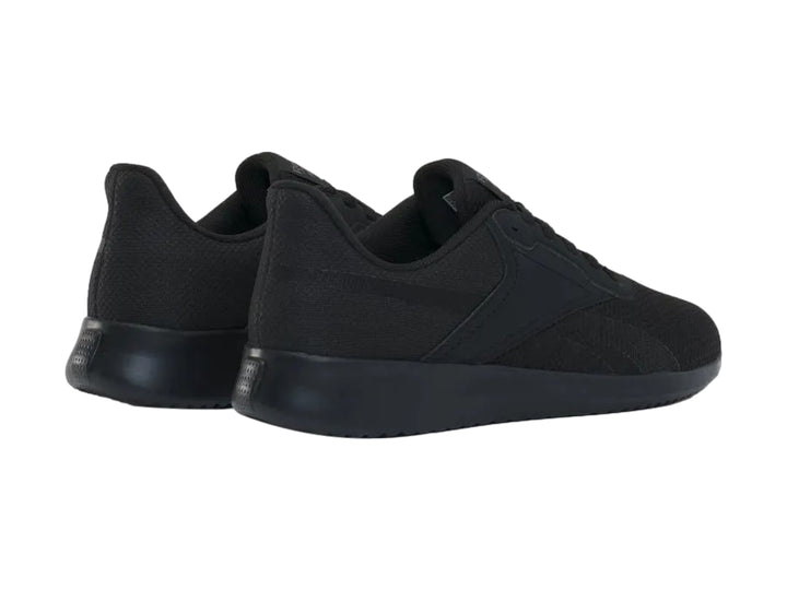 Zapato deportivo Reebok Fluxlite en color negro sólido con tejido de malla y suela a juego.
