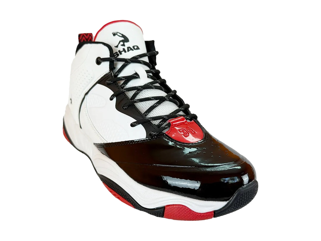 Tenis de baloncesto SHAQ de bota alta en color blanco con detalles en negro brillante y suela roja.