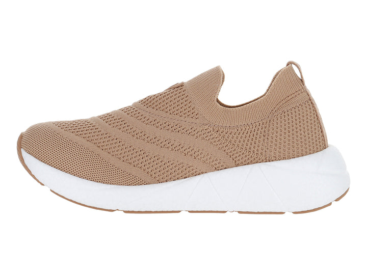 Zapato plano Modare color nude de tejido flexible con suela blanca gruesa y diseño slip-on.