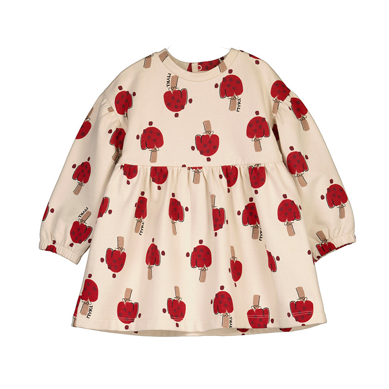 Vestido color crema para niña con estampado de paletas rojas y manga larga.