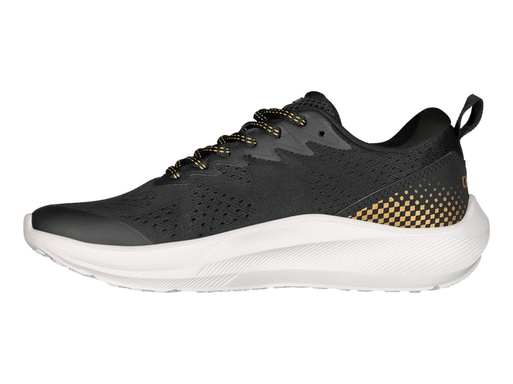 Tenis deportivos Charly color negro con detalles en oro y suela blanca gruesa.
