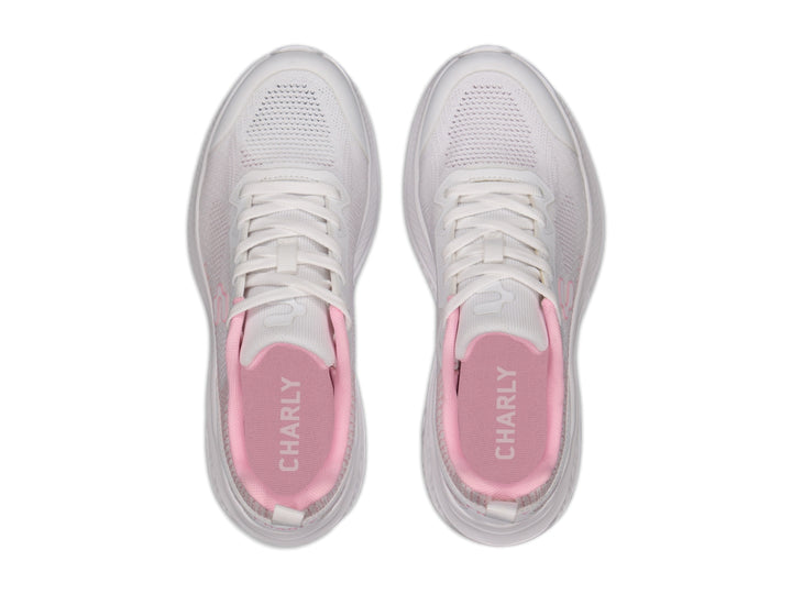 Tenis deportivos Charly en color blanco con detalles en rosa, diseño casual y suela blanca.