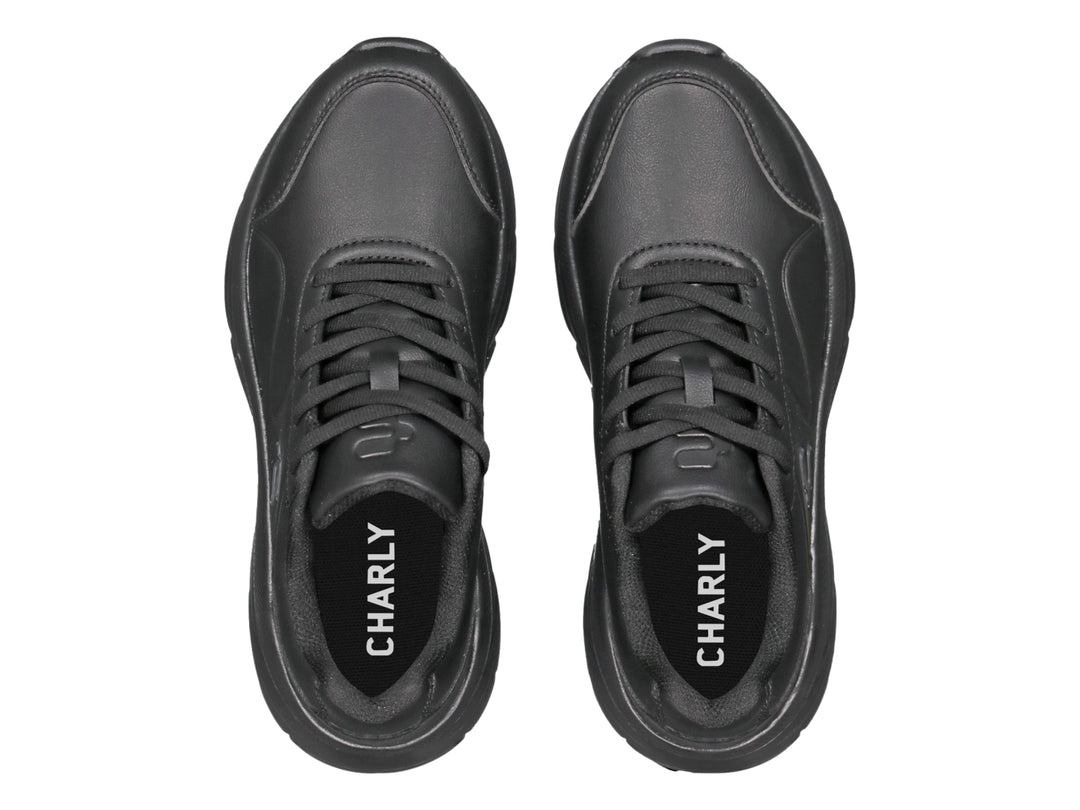 Tenis deportivos Charly color negro total con suela robusta y diseño moderno.