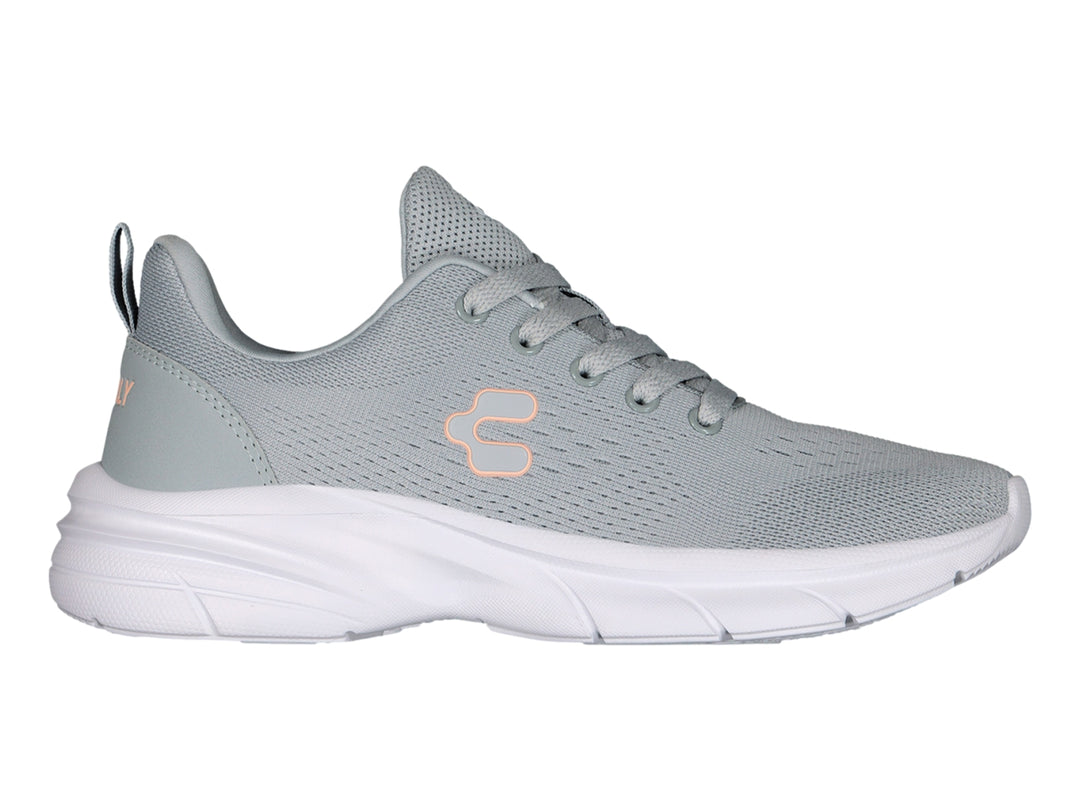 Tenis deportivos Charly color gris con suela blanca y logotipo en tono durazno.