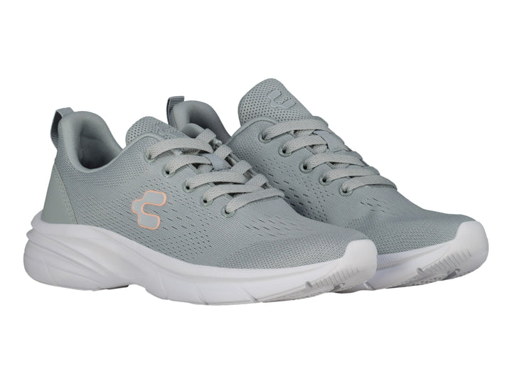 Tenis deportivos Charly color gris con suela blanca y logotipo en tono durazno.