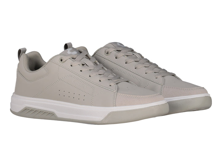 Tenis Charly color gris urbano con suela blanca y cordones, vista lateral.
