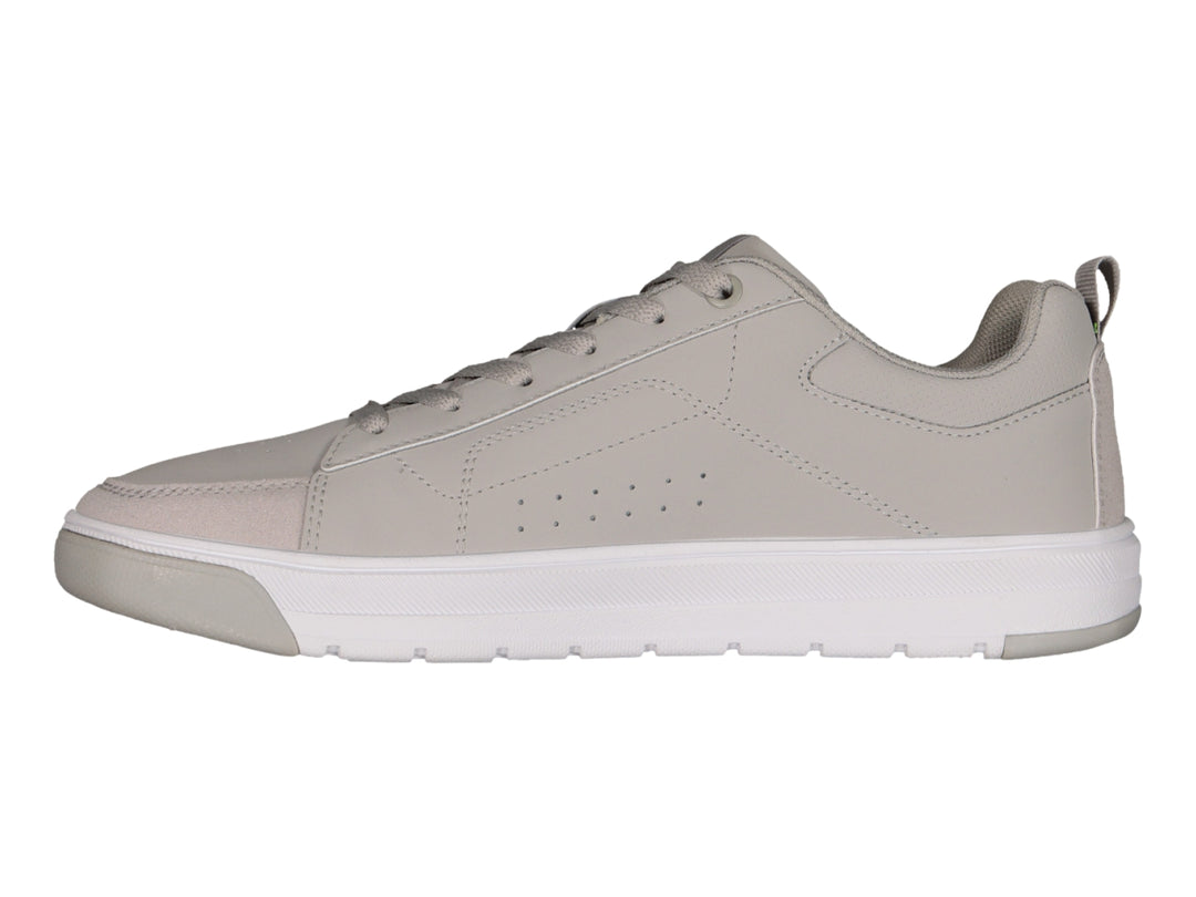 Tenis Charly color gris urbano con suela blanca y cordones, vista lateral.