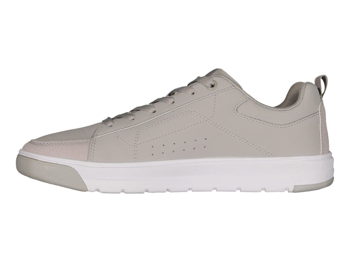 Tenis Charly color gris urbano con suela blanca y cordones, vista lateral.