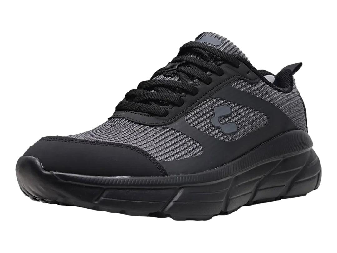 Tenis deportivos Charly color gris y negro para hombre con suela gruesa y tejido de malla.