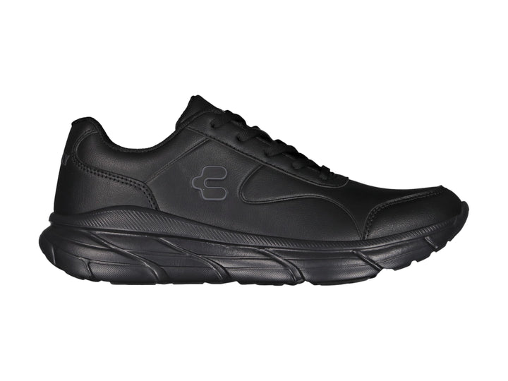 Tenis deportivos color negro de la marca Charly con suela gruesa y acabado mate.