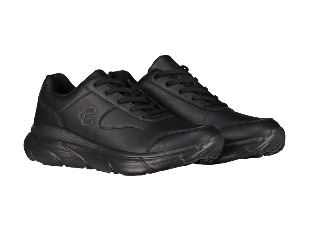 Tenis deportivos color negro de la marca Charly con suela gruesa y acabado mate.