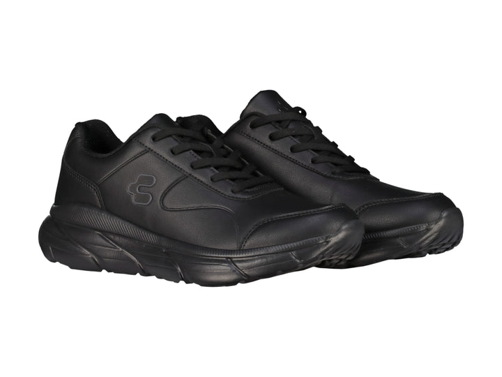 Tenis deportivos color negro de la marca Charly con suela gruesa y acabado mate.