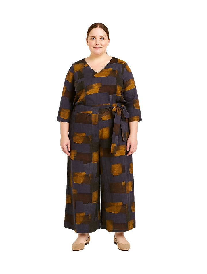 Conjunto de ropa para Mujer en color tabaco y gris con estampado geométrico, compuesto por blusa y pantalón ancho.