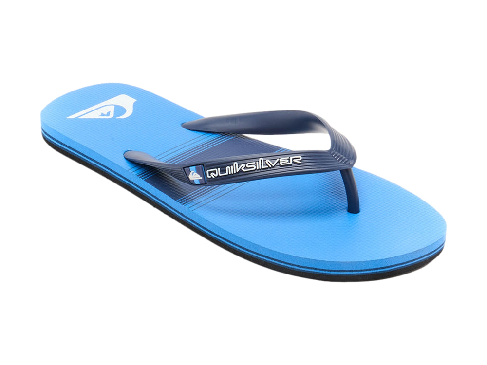Sandalias Quiksilver azules con tiras azul marino y suela negra.