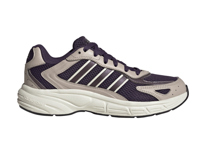 Tenis Adidas color morado y blanco hueso con suela gruesa y detalles de malla.