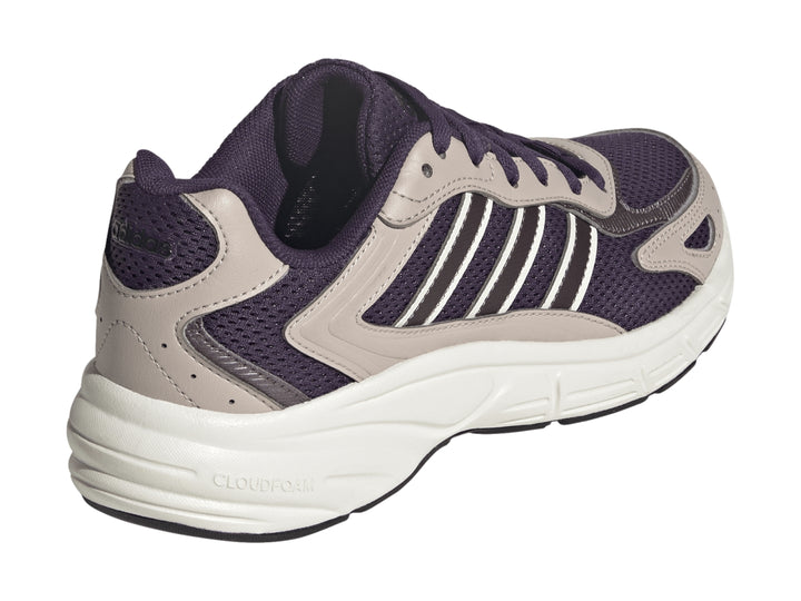 Tenis Adidas color morado y blanco hueso con suela gruesa y detalles de malla.