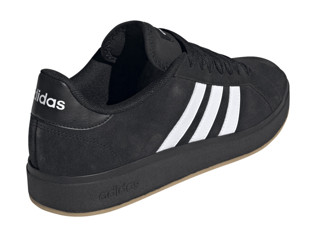 Tenis Adidas Grand Court Base 00s en color negro con tres franjas blancas laterales y suela negra.