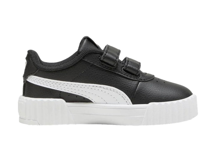 Tenis PUMA infantiles color negro con suela blanca y cierre de velcro.
