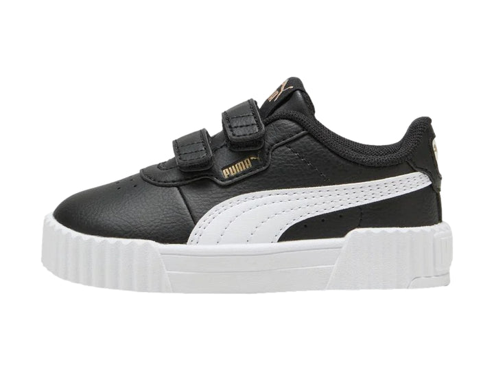 Tenis PUMA infantiles color negro con suela blanca y cierre de velcro.